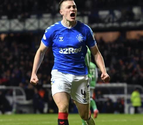 George Edmundson celebrates scoring Rangers equaliser against Hibs on Wednesday. I felt Id redeemed myself he said. Picture: SNS.