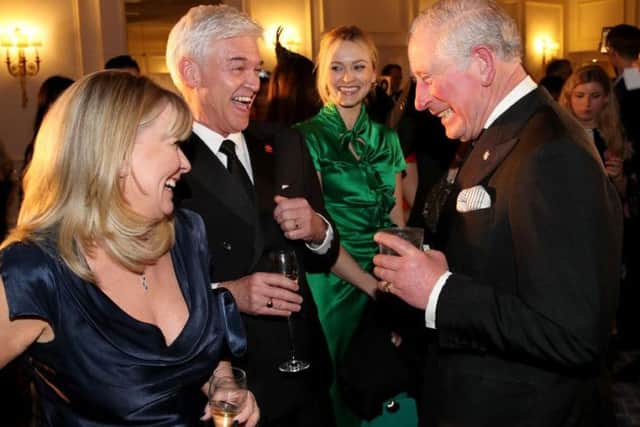 Prince Charles shares a joke with Lowe, Schofield and Fearne Cotton in 2019 (Photo: Chris Jackson - WPA Pool/Getty Images)