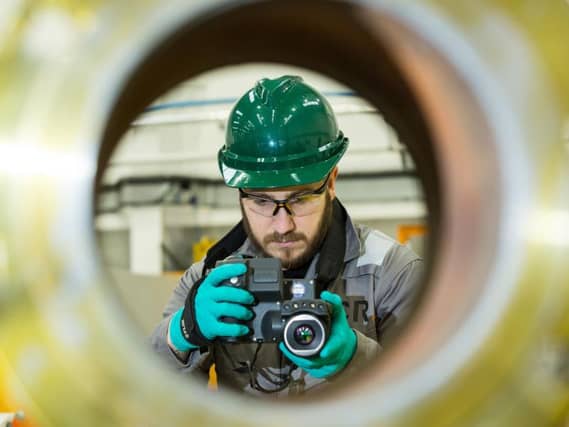 An ICR technician conducts a thermal imaging inspection using the latest camera technology. Picture: Simon Price