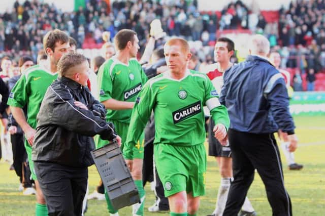 Neil Lennon glares at a ballboy as he walks off the pitch after Celtic suffered a 2-1 Scottish Cup defeat by tomorrows opponents Clyde. Picture: SNS.