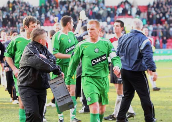 Neil Lennon glares at a ballboy as he walks off the pitch after Celtic suffered a 2-1 Scottish Cup defeat by tomorrows opponents Clyde. Picture: SNS.