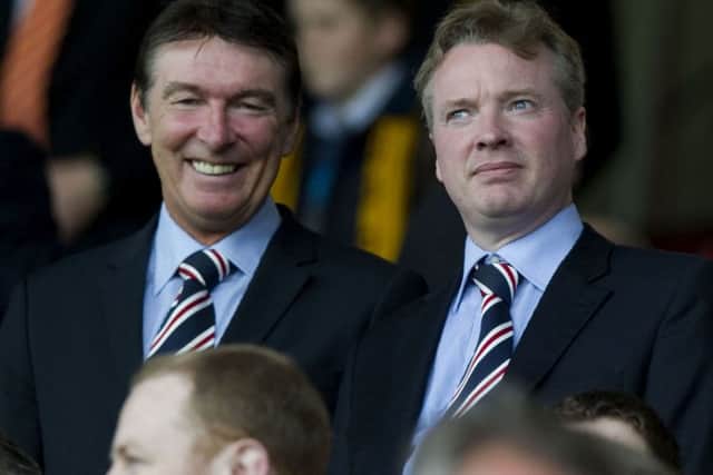Craig Whyte with then Rangers director of football Gordon Smith at Fir Park in 2011. Picture: SNS