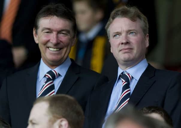 Craig Whyte with then Rangers director of football Gordon Smith at Fir Park in 2011. Picture: SNS