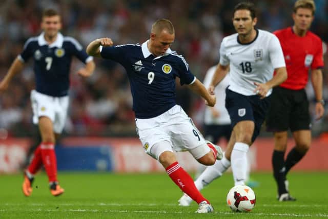 One of Kenny Miller's finest goals as he sweeps the ball home against England at Wembley in his final appearance for Scotland in 2013. Picture: Clive Mason/Getty Images