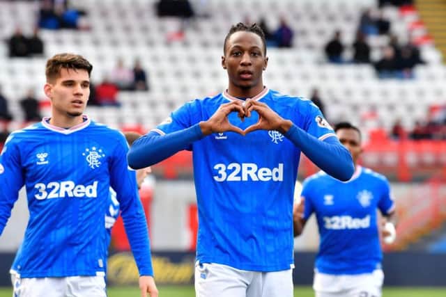 Joe Aribo celebrates after making it 2-1 Rangers. Picture: SNS
