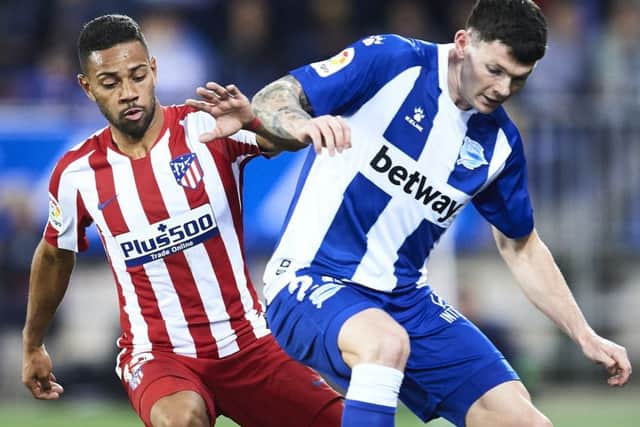 Scotland winger Oliver Burke, right, is playing in Spain for Alaves. Picture: Juan Manuel Serrano Arce/Getty Images
