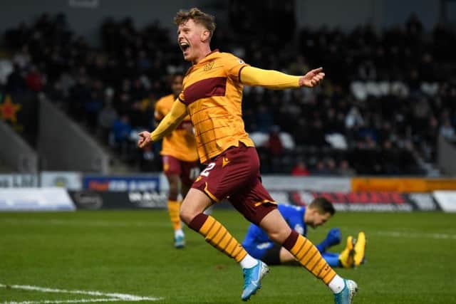 Mark O'Hara celebrates after opening the scoring. Picture: SNS