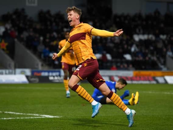 Mark O'Hara celebrates after opening the scoring. Picture: SNS