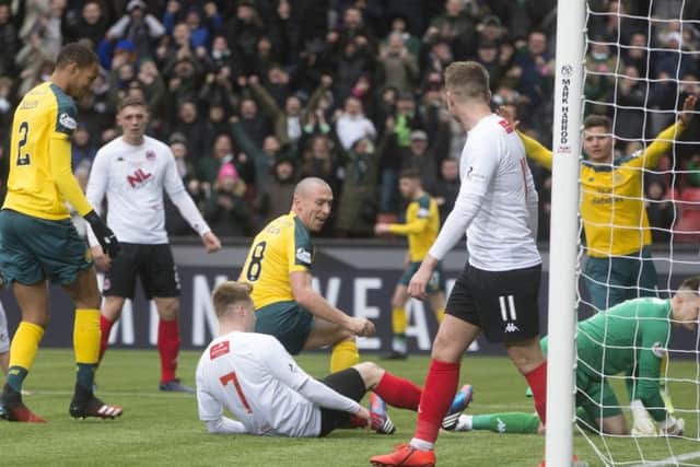 Scott Brown, No 8, scores Celtic's second goal in their 3-0 victory over Clyde. Picture: PA.