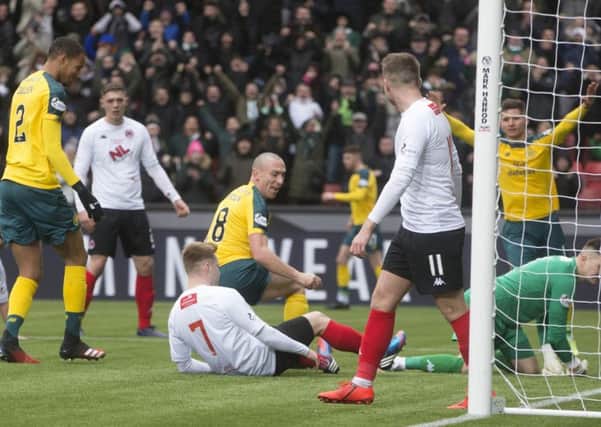 Scott Brown, No 8, scores Celtic's second goal in their 3-0 victory over Clyde. Picture: PA.