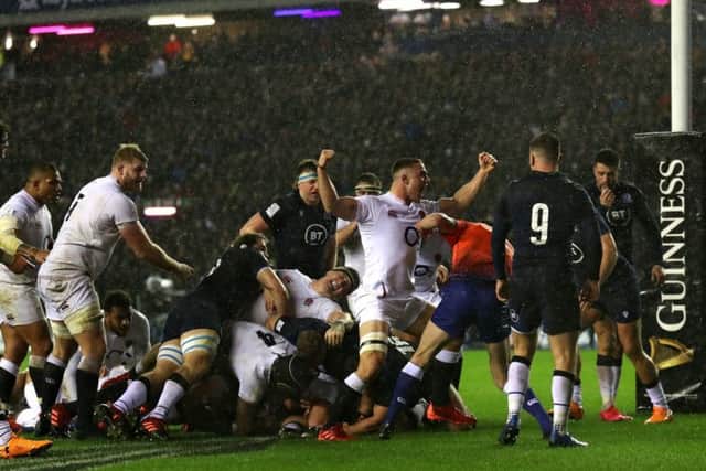 England players celebrate as Ellis Genge touches down for the only try of Saturday's Calcutta Cup clash. Picture: Andrew Milligan/PA