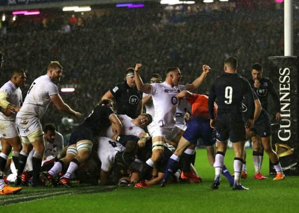 England players celebrate as Ellis Genge touches down for the only try of Saturday's Calcutta Cup clash. Picture: Andrew Milligan/PA