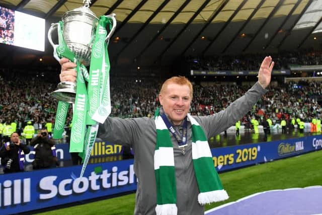 Celtic manager Neil Lennon with the Scottish Cup following victory over Hearts in last year's final. His side will face St Johnstone in this season's quarter-final. Picture: SNS.