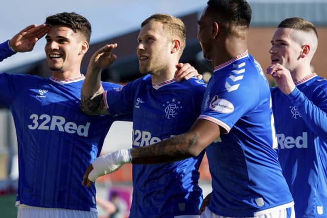 Scott Arfield, centre, celebrates putting Rangers in front in the Scottish Cup win over Hamilton Accies. Picture: Craig Williamson/SNS