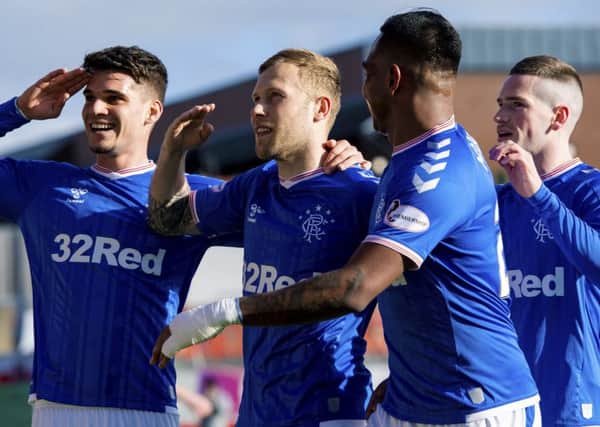Scott Arfield, centre, celebrates putting Rangers in front in the Scottish Cup win over Hamilton Accies. Picture: Craig Williamson/SNS