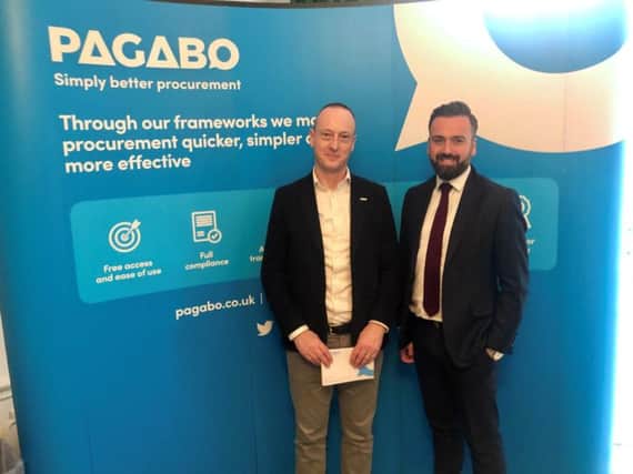 Pagabo CEO Simon Toplass with AM Bid managing director David Gray. Picture: Contributed