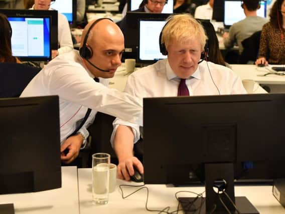 Sajid Javid and Boris Johnson. Picture: PA