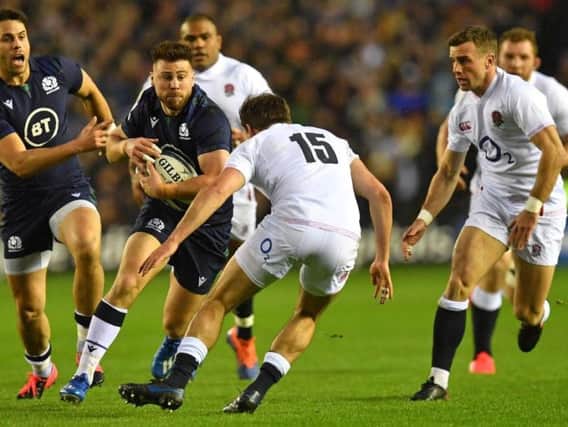 Scotland scrum-half Ali Price is tackled by England full-back George Furbank during the Six Nations match at Murrayfield (Picture: Getty)