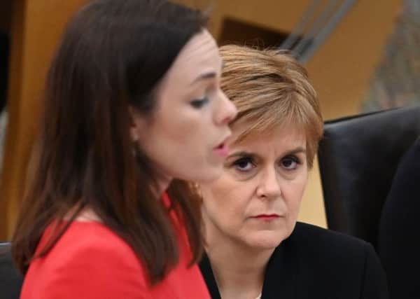 Kate Forbes presents the Governments plans for the Scottish Budget as Nicola Sturgeon looks on (Picture: Andy Buchanan/AFP via Getty Images)