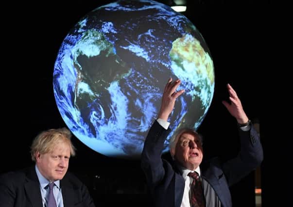 Boris Johnson sits with Sir David Attenborough during the launch of the Cop26 UN Climate Summit, which will take place this autumn in Glasgow (Picture: Chris J Ratcliffe-WPA Pool/Getty Images)