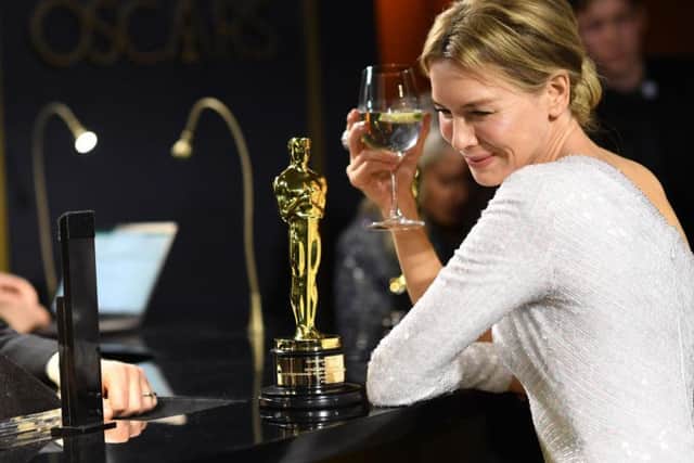 US actress Renee Zellweger waits for her award for Best Actress in a Leading Role for 'Judy' to be engraved at the 92nd Oscars. Picture: Valerie Macon