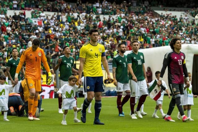 June 2018, captain
Scott McKenna leads the Scotland team out at Estadio Azteca for a friendly against Mexico. Picture: Alan Harvey/SNS