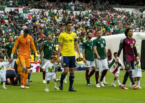 June 2018, captain 
Scott McKenna leads the Scotland team out at Estadio Azteca for a friendly against Mexico. Picture: Alan Harvey/SNS