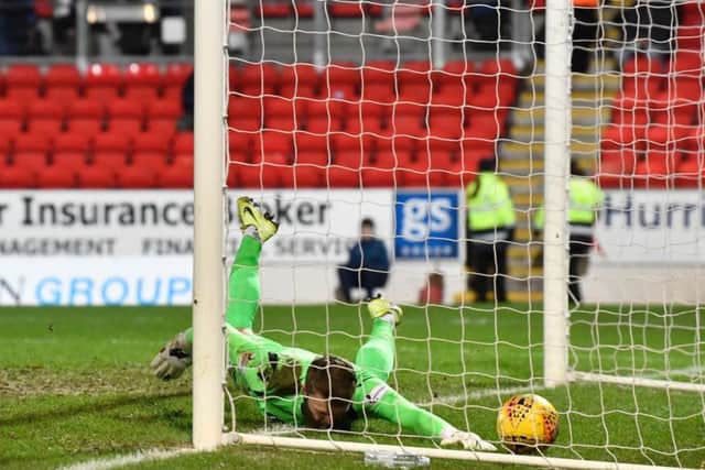 Zander Clark is unable to stop the ball spinning over the line after a blunder by the St Johnstone goalkeeper. Picture: SNS