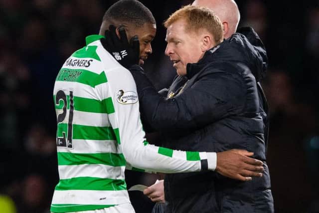 Celtic boss Neil Lennon thanks Olivier Ntcham for his contribution as the midfielder leaves the field. Picture: SNS