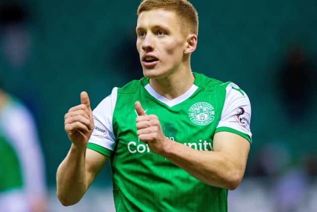 On-loan Rangers midfielder Greg Docherty celebrates Hibs' 3-0 league victory over Ross County at Easter Road on Wednesday night. Ross Parker/SNS