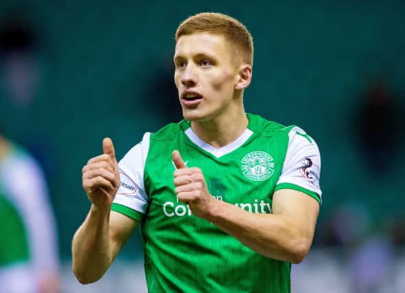 On-loan Rangers midfielder Greg Docherty celebrates Hibs' 3-0 league victory over Ross County at Easter Road on Wednesday night. Ross Parker/SNS