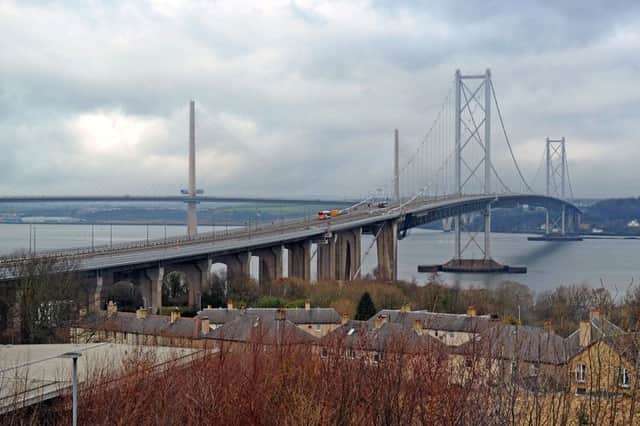 The Queensferry Crossing, left, was opened as a replacement for the Forth Road Bridge in 2017. Picture: Michael Gillen