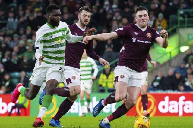 John Souttar, right, says Hearts cannot afford to dwell on their midweek defeat by Celtic as they prepare to face fellow Premiership strugglers Hamilton and St Mirren in the next seven days. Picture: Alan Harvey/SNS