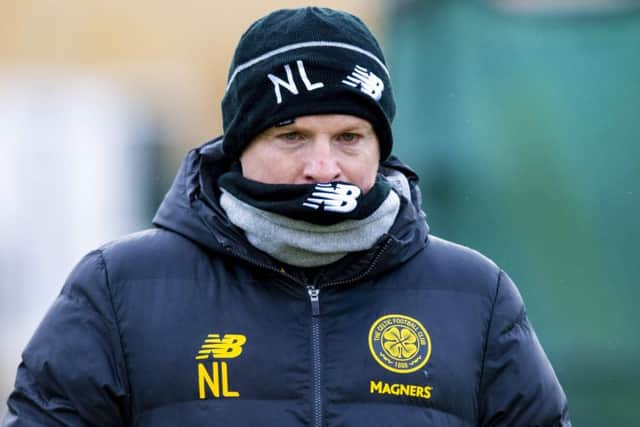 The morning after his side moved ten points clear in the title race, Neil Lennon was back on the training pitch preparing for Celtic's trip to Aberdeen. Picture: Craig Williamson/SNS