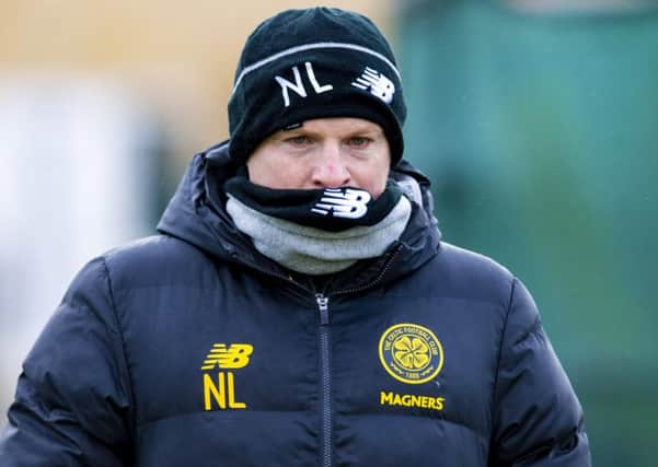 The morning after his side moved ten points clear in the title race, Neil Lennon was back on the training pitch preparing for Celtic's trip to Aberdeen. Picture: Craig Williamson/SNS