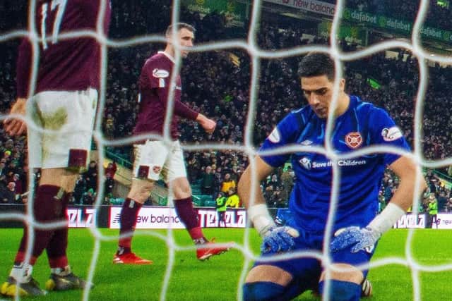 A disconsolate Joel Pereira after conceding a goal in Hearts' 5-0 defeat at Celtic. Picture: SNS