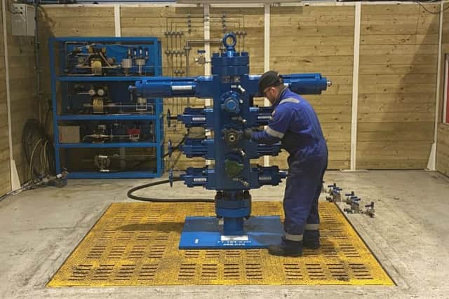 RMEC's Lee Alexander setting up client-owned equipment for hydrostatic testing at the firms new test bay. Picture: Contributed
