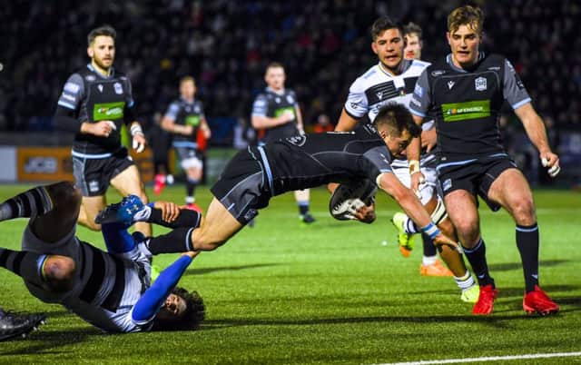 Glasgow scrum-half George Horne dives over to score his second try of the night. Picture: Craig Williamson/SNS