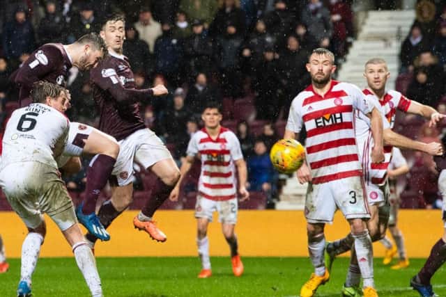 Craig Halkett rescued a point for Hearts at the death