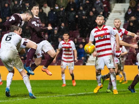 Craig Halkett rescued a point for Hearts at the death
