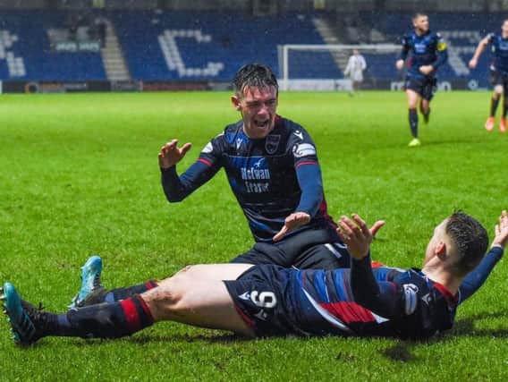 Billy Mckay celebrates his late, late equaliser