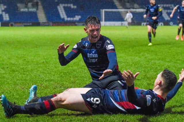 Billy Mckay celebrates his late, late equaliser