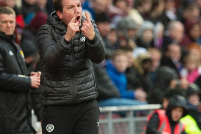 Daniel Stendel barks instructions at his team from the dugout