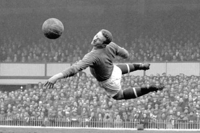 Harry Gregg, in action for Manchester United in 1958, has died aged 87. Picture: PA