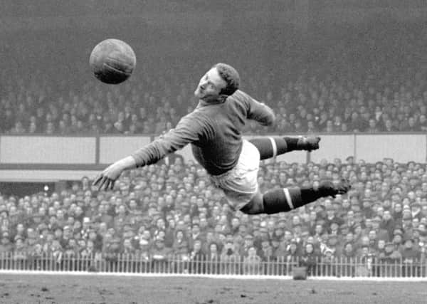 Harry Gregg, in action for Manchester United in 1958, has died aged 87. Picture: PA