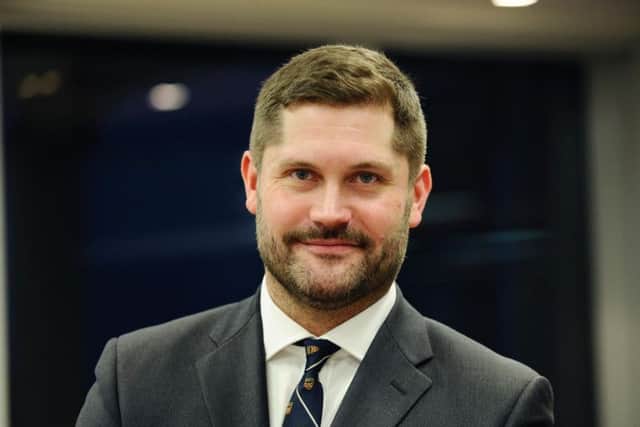 Construction sector specialist and senior associate Craig Macphee, who collected the award on behalf of colleagues. Picture: Contributed