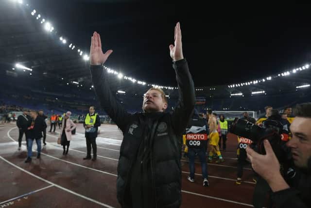 Celtic manager Neil Lennon hails the travelling Celtic fans after a late goal by Olivier Ntcham silenced the Lazio supporters in the Stadio Olimpico. Picture: Paolo Bruno/Getty