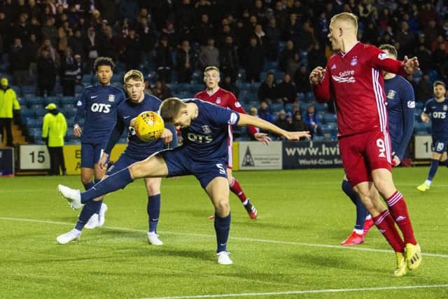 Kilmarnocks Connor Johnson scores a last-gasp own goal to make it 4-3 for Aberdeen. Picture: Ross MacDonald/SNS