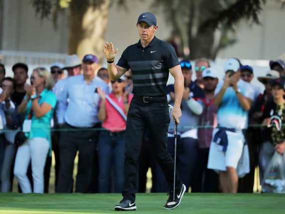 World No 1 Rory McIlroy acknowledges the crowd as he opens with a six-under-par 65 in the WGC-Mexico Championship. Picture: Getty Images