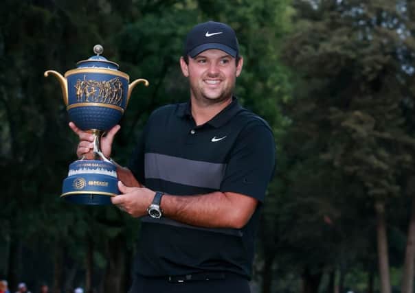 Patrick Reed with the Gene Sarazen Cup after winning the WGC Mexico Championship. Picture: Hector Vivas/Getty
